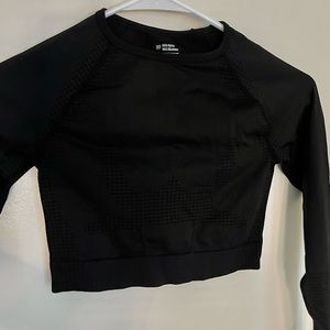 gym long sleeve with textures, finger holes on each arm sleeve